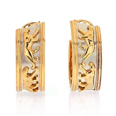 Orecchini a cerchio vintage Cartier “Walking Panther” bicolore in oro 18 carati