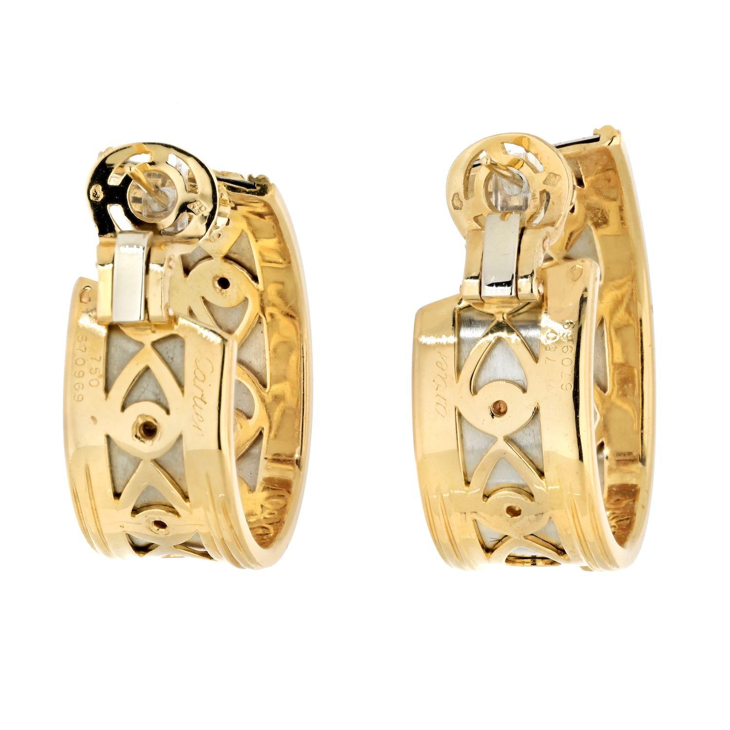 Cartier Vintage Panthère de Cartier walking panther hoop earrings in 18kt yellow gold, French, 1980s. A true collector#s piece, each of these earrings is designed as a wide hoop featuring three walking panthers. This pair of earrings is an iconic
