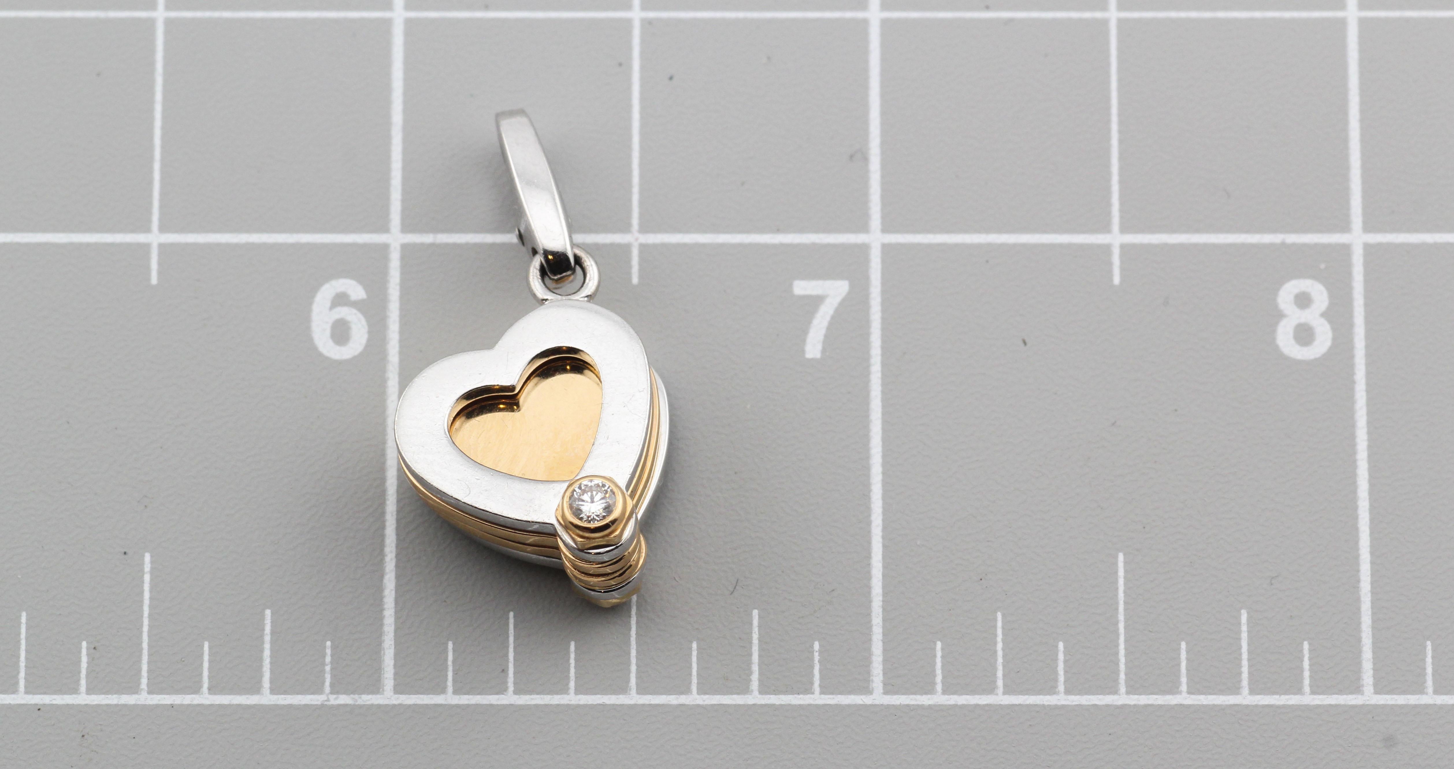 Introducing the Cartier 18K White and Pink Gold Clover Charm Pendant, a captivating and intricately designed jewelry piece that combines the symbolism of a four-leaf clover with the elegance of Cartier's craftsmanship. This pendant is an exquisite