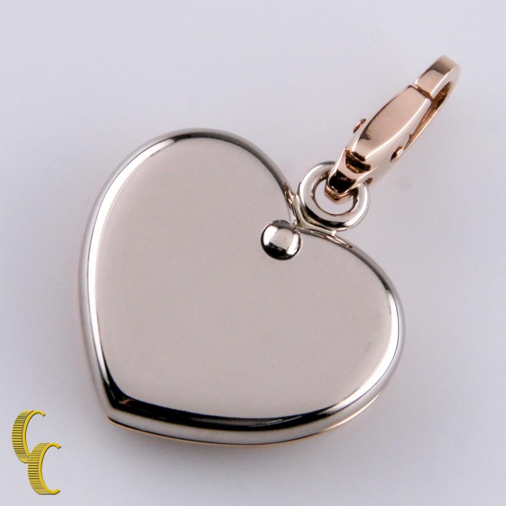 Gorgeous Two-Tone 18k Gold Double Heart Charm by Cartier!
Features Two Solid Gold Hearts Connected on a Hinge. One is Rose Gold, the other is White Gold
Hearts are 18 mm Wide and approximately 15 mm long
Hallmarked 