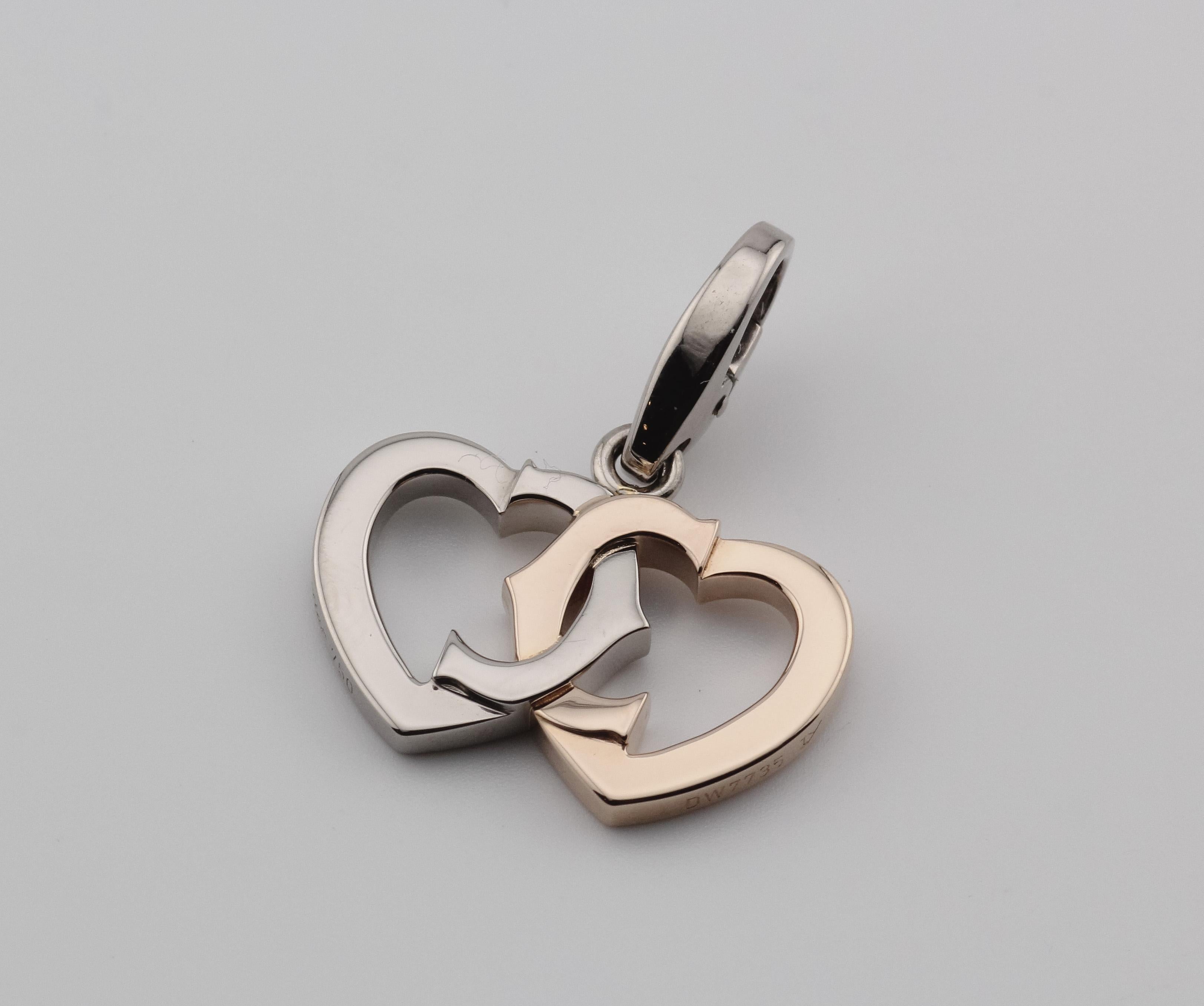 Contemporary Cartier 18K White and Rose Gold Double Heart Logo Charm Pendant For Sale