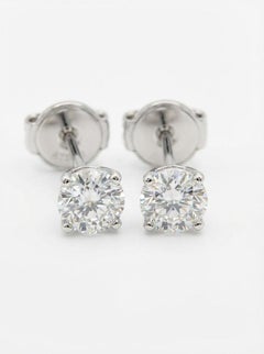 Cartier 18K White Gold 0.50 Carat Round Brilliant Cut Diamond Stud Earrings