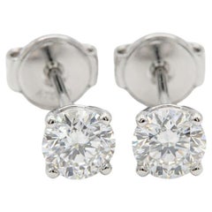 Cartier 18K White Gold 0.50 Carat Round Brilliant Cut Diamond Stud Earrings