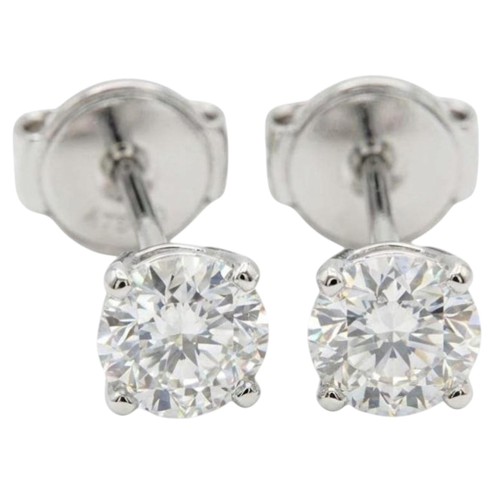 Cartier 18K White Gold 0.50 Carat Round Brilliant Cut Diamond Stud Earrings