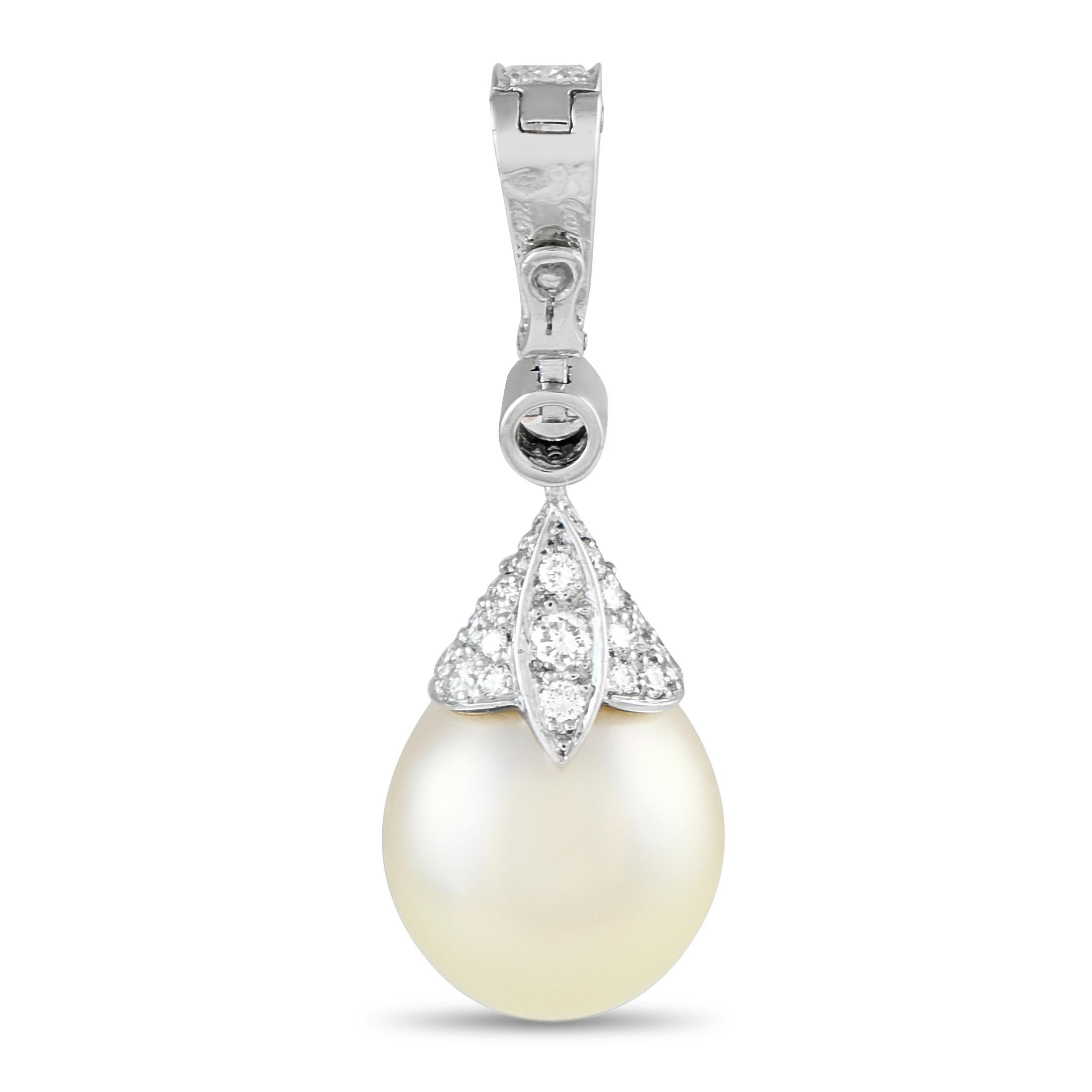 This breathtaking Cartier pendant allows you to create a perfectly customized piece of jewelry. This classically inspired piece features 18K White Gold metalwork that is elevated by sparkling Diamonds totaling 0.75 carats. A single 13mm pearl at the