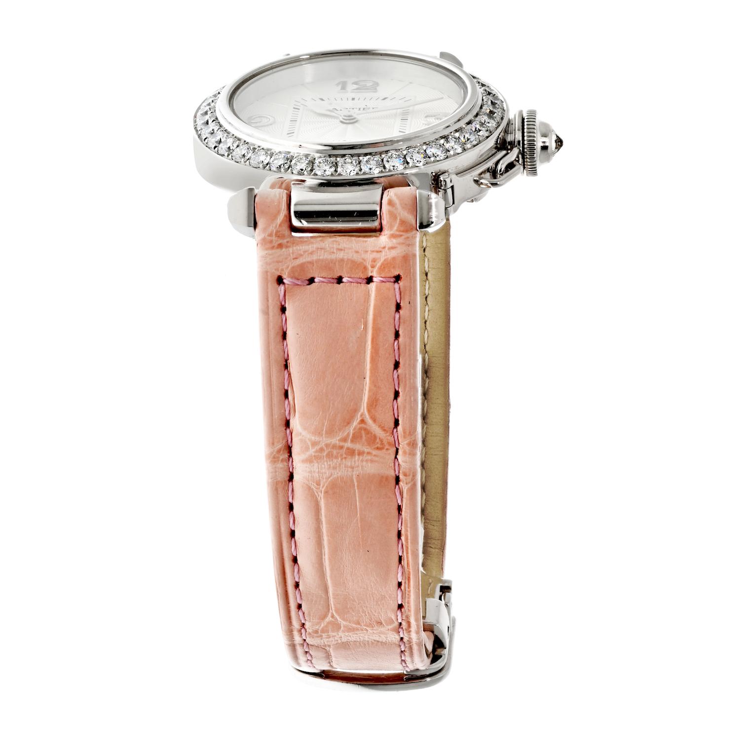 The Cartier 18K White Gold 32mm Pasha Factory Diamond Bezel 2528 ladies watch on a pink leather strap is a luxurious timepiece that embodies the sophisticated and timeless style of the Cartier brand. This watch features an 18K white gold case with a