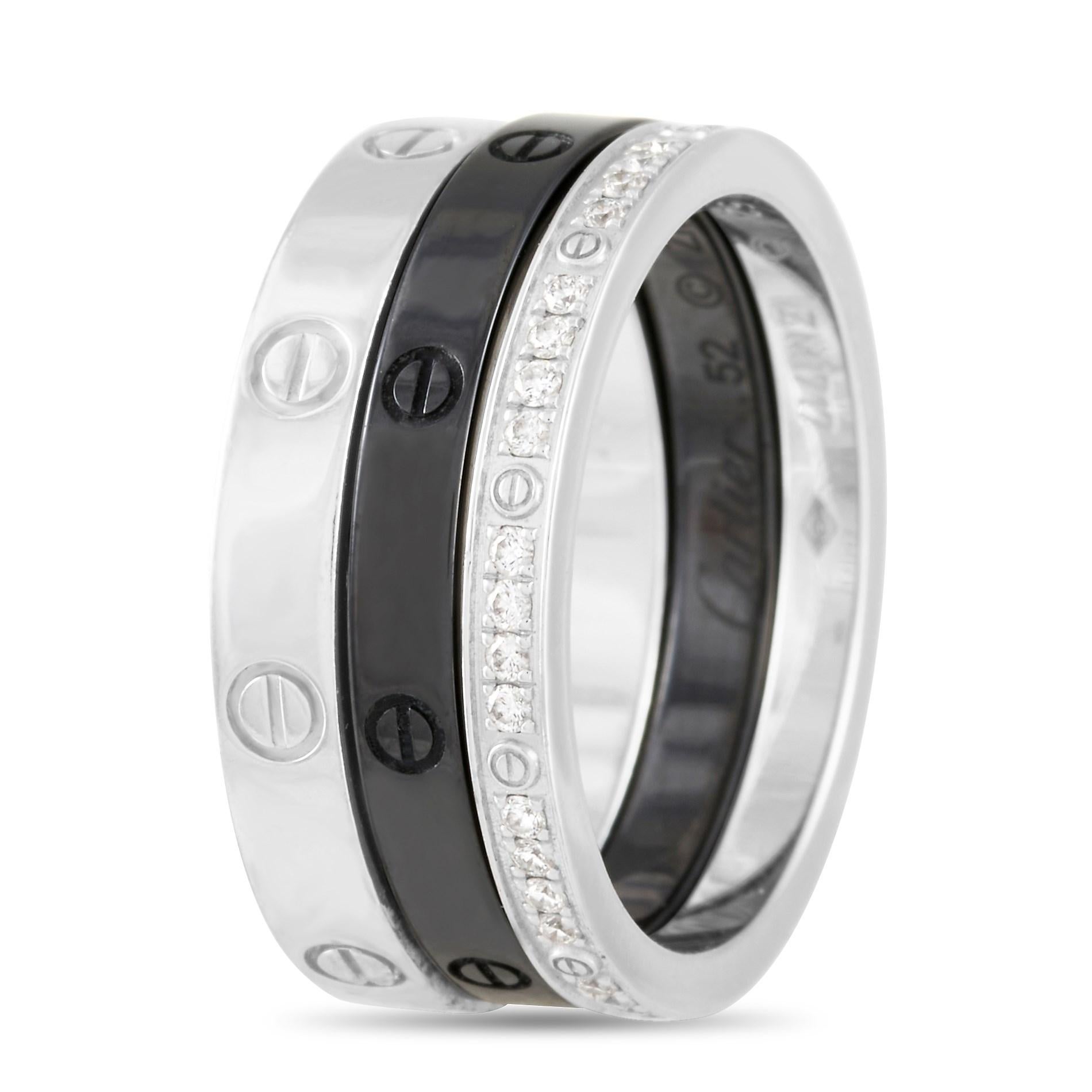 This Cartier 18K White Gold and Ceramic Diamond Love 3 Ring Set is comprised of three bands, two made with 18K white gold and one of black ceramic. The first white gold band measures 2 mm and is set with round-cut diamonds throughout as well as the