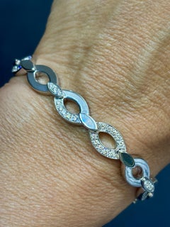 Cartier 18k White Gold and Diamond Diadea Bracelet, Circa 1990, France