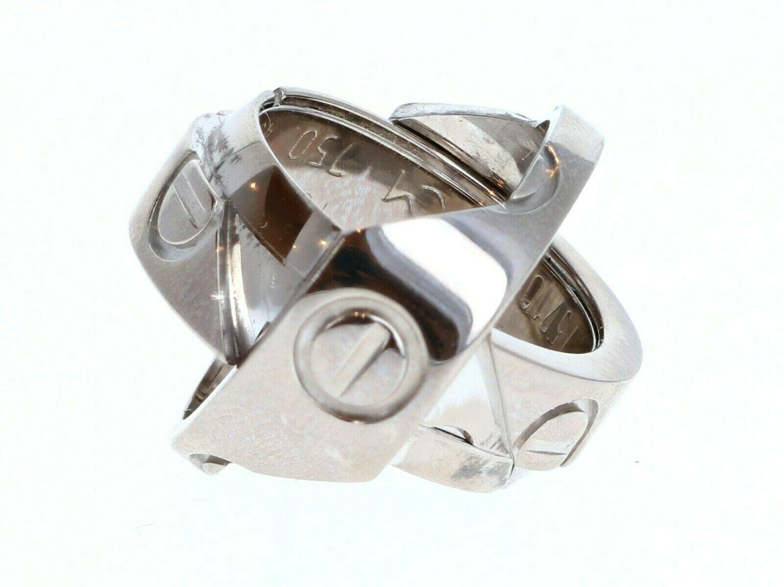 Cartier 18k White Gold Astro Love Band Ring 11.8g Size 49 

For sale is a cartier astro love band ring 
The ring is a size 49 US size 5.25
 Perfect worn day or night.
 Get this stunning ring now!



Metal: 18k White gold
     
Hallmark: Cartier 750