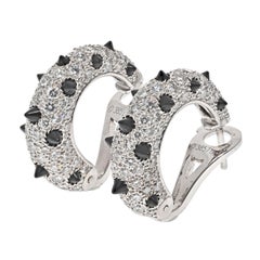 Boucles d'oreilles Clash en or blanc 18 carats, diamants et onyx noir de Cartier