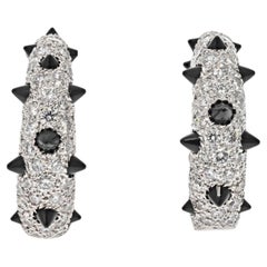 Cartier Ohrringe aus 18 Karat Weißgold mit geschliffenen Diamanten und schwarzem Onyx