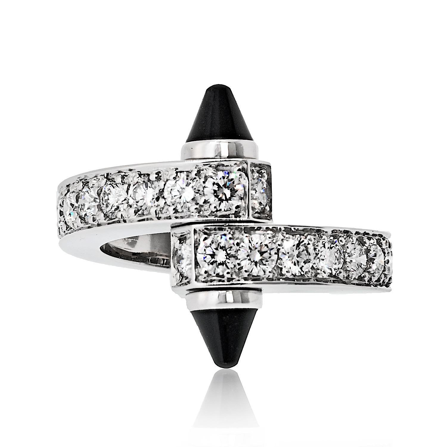 This exquisite Cartier Menotte Ring is crafted in luxurious 18K white gold with a high-polish finish, showcasing Cartier's timeless elegance and craftsmanship. The ring features a striking combination of black onyx and sparkling diamonds, making it