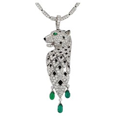 Collana Panthere Cartier in oro bianco 18k con diamanti, smeraldi e onice