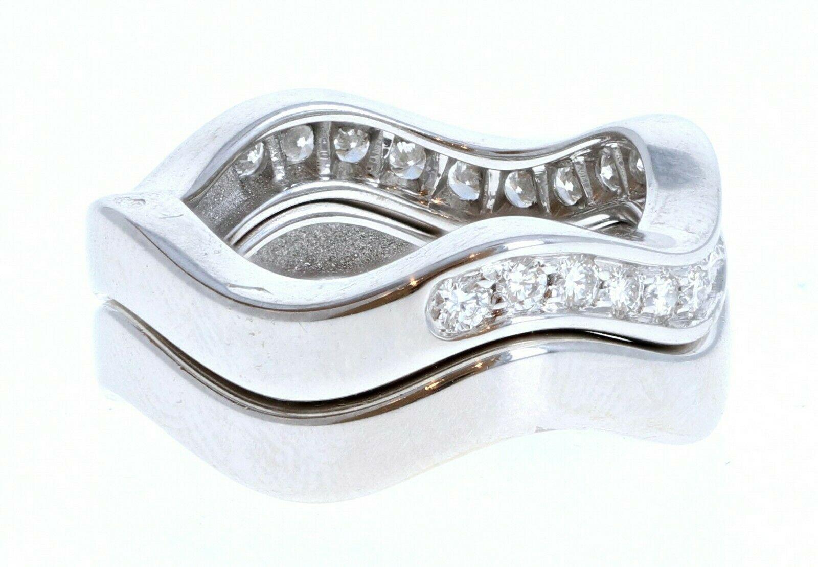 Cartier 18k White Gold & Diamond Neptune Band Set of Two Rings Size 48 

For sale is a cartier neptune rings
The rings are size 48 US size 4.5
This listing includes two rings.
One band is 18k white gold half diamond and the other one is 18k white