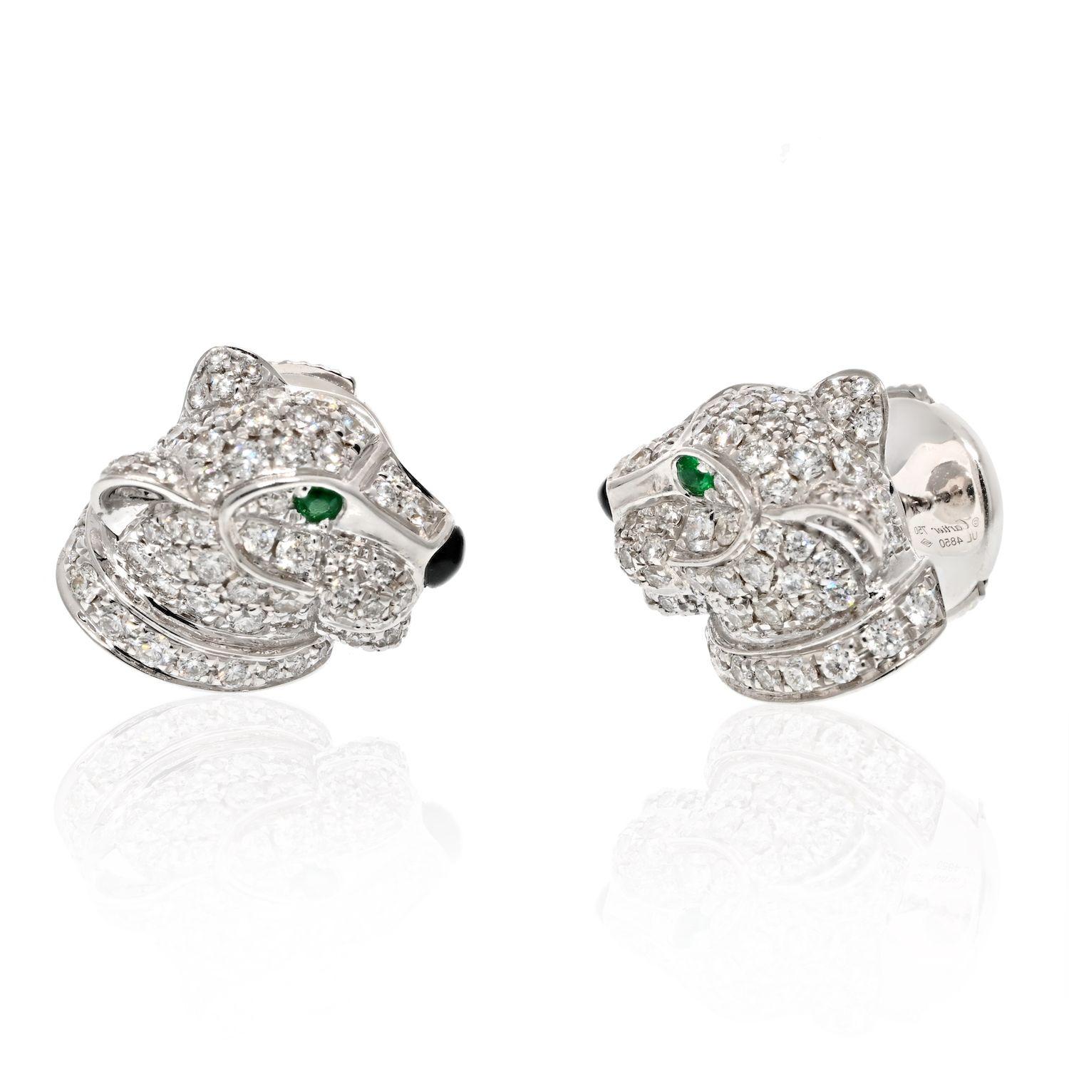 Cartier 18K White Gold Diamond Panthere Heads Stud Earrings.
Each designed as a panther's head set with diamonds, emerald eyes and onyx nose. 
Metal: 18k white gold. Panthère de Cartier earrings, white gold 750, each set with emeralds, onyx and 63