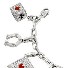 CARTIER 18K White Gold, Diamond, Turquoise, Ruby and Enamel 10-Charm Bracelet