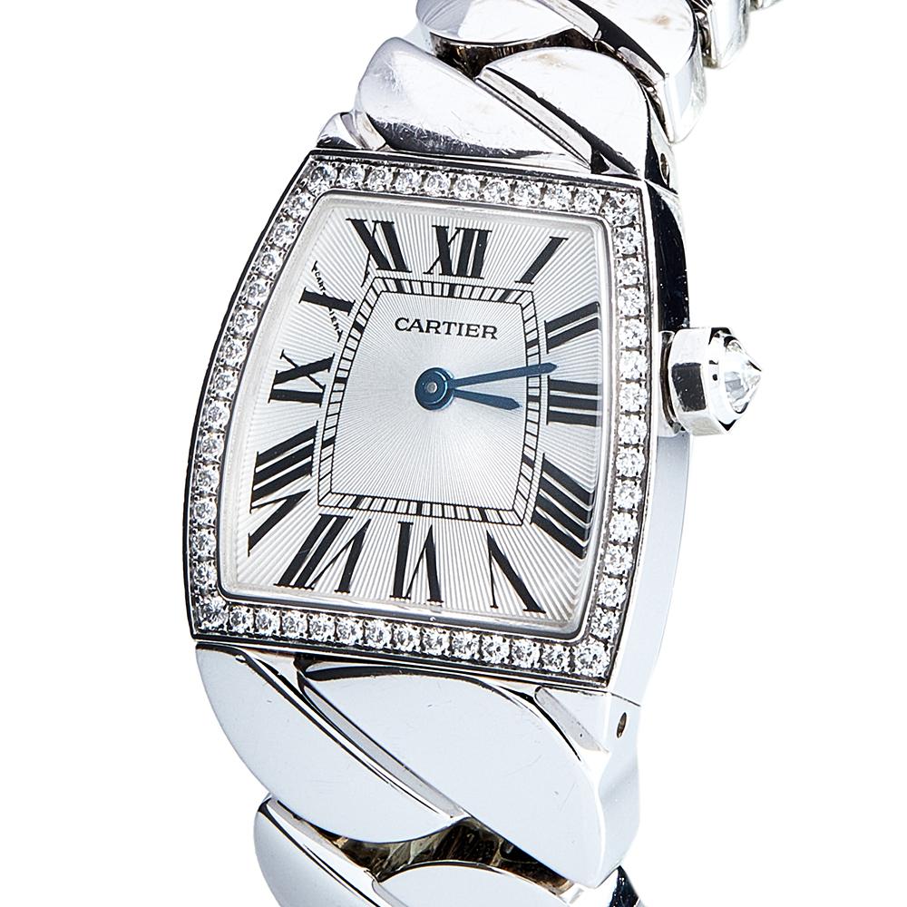 Wristwatches work as good as jewelry when accessorized right. Take a look at the beauty of this Cartier. It comes made from 18k white gold with a braid-like bracelet and a diamond-embellished bezel, fully ready to charm. The sapphire glass on the