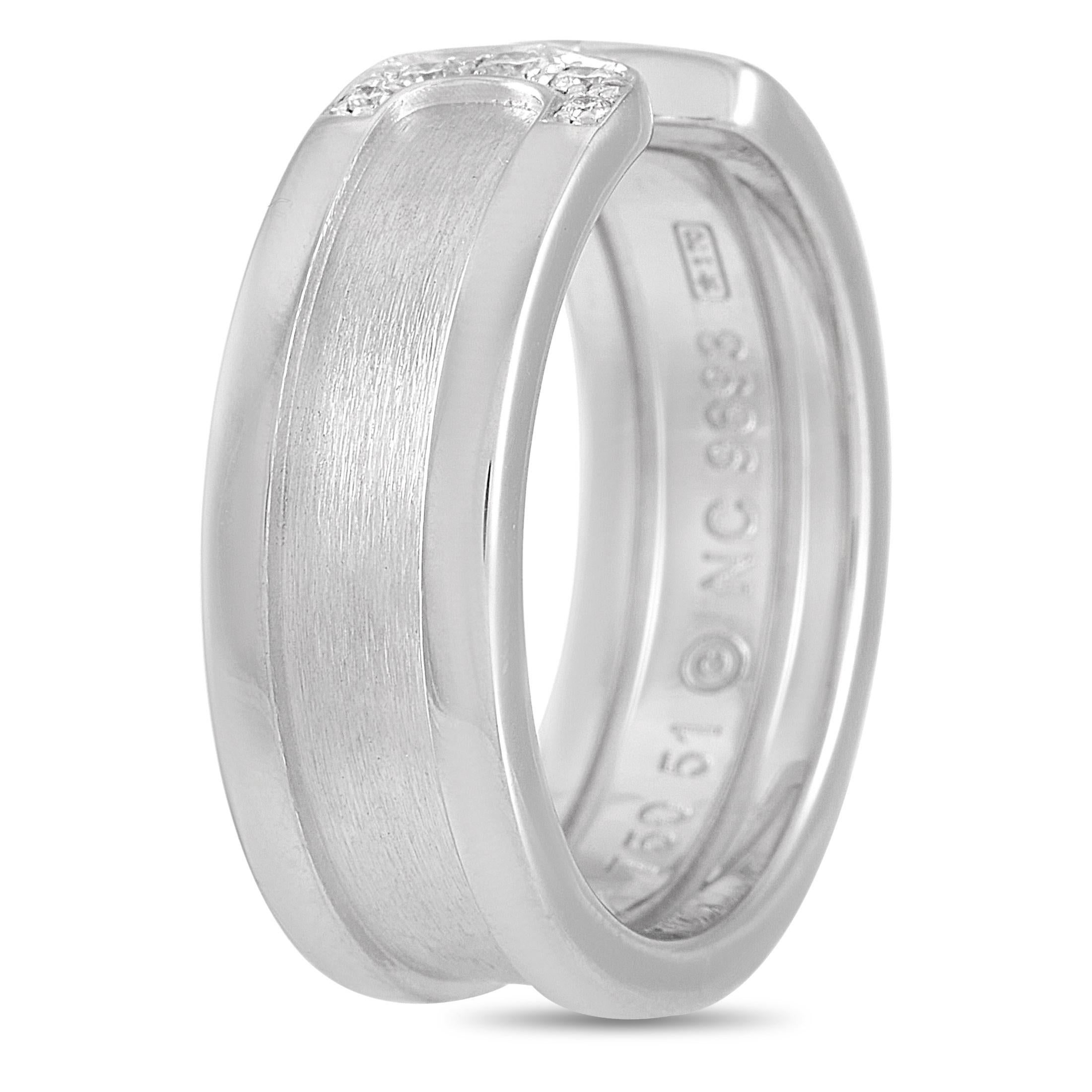 This Cartier 18K White Gold Double C Diamond Ring is decidedly modern while maintaining the signature Cartier style. The band is made with 18K white gold with a satin-finished indent around the middle of the band. At the ring's face, both sides come