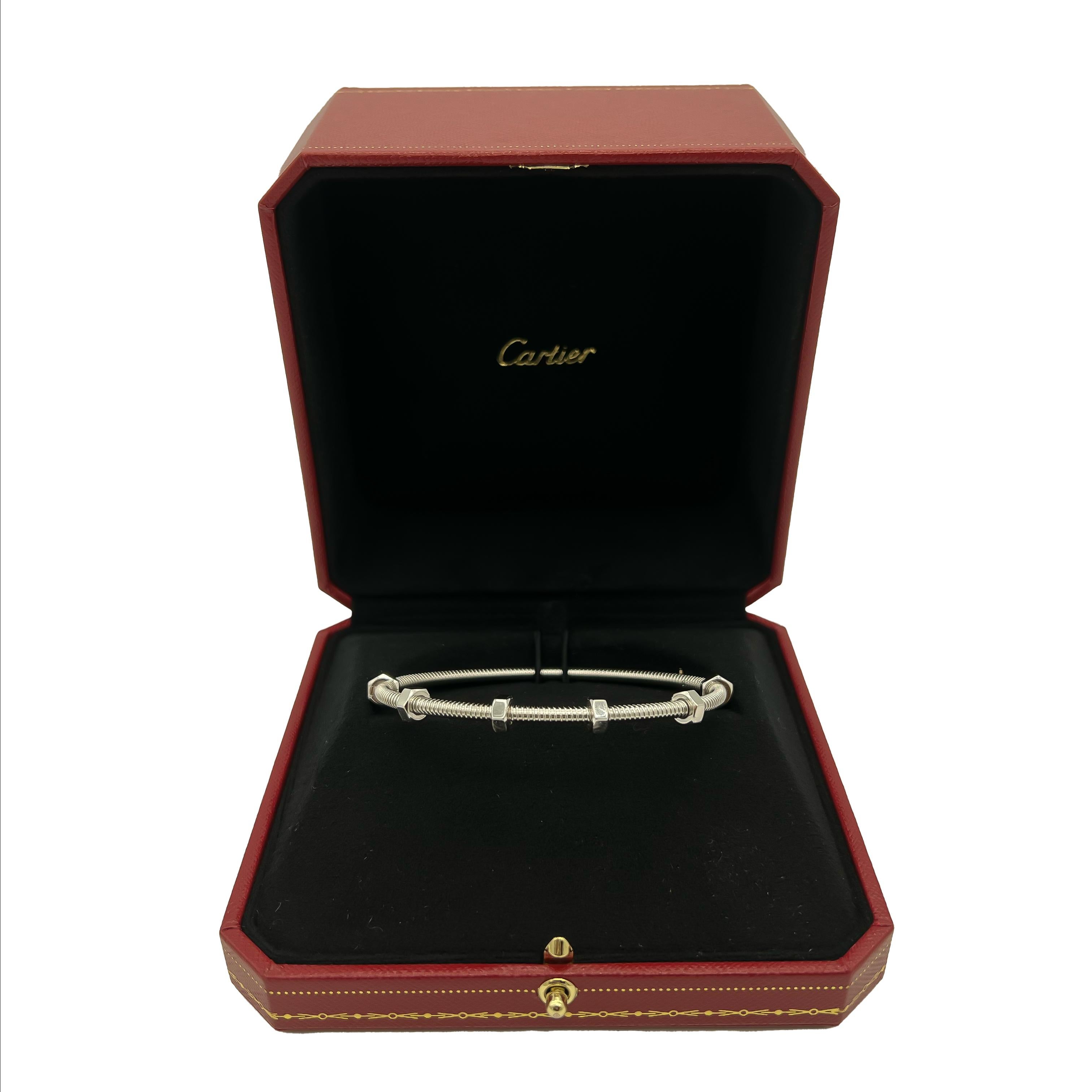 Marque : Cartier 
Modèle : Bracelet Ecrou De Cartier 
Référence : CRB6049619 
Type de produit : Bracelet 
Numéro de série - LX**** 
Age : Circa 2022 
Accompagné de-Boîte de Cartier, Reçu 
MATERIAL(S) : Or blanc 18ct
Taille CM 17-17.9 IN 6.7-7.0 : 19