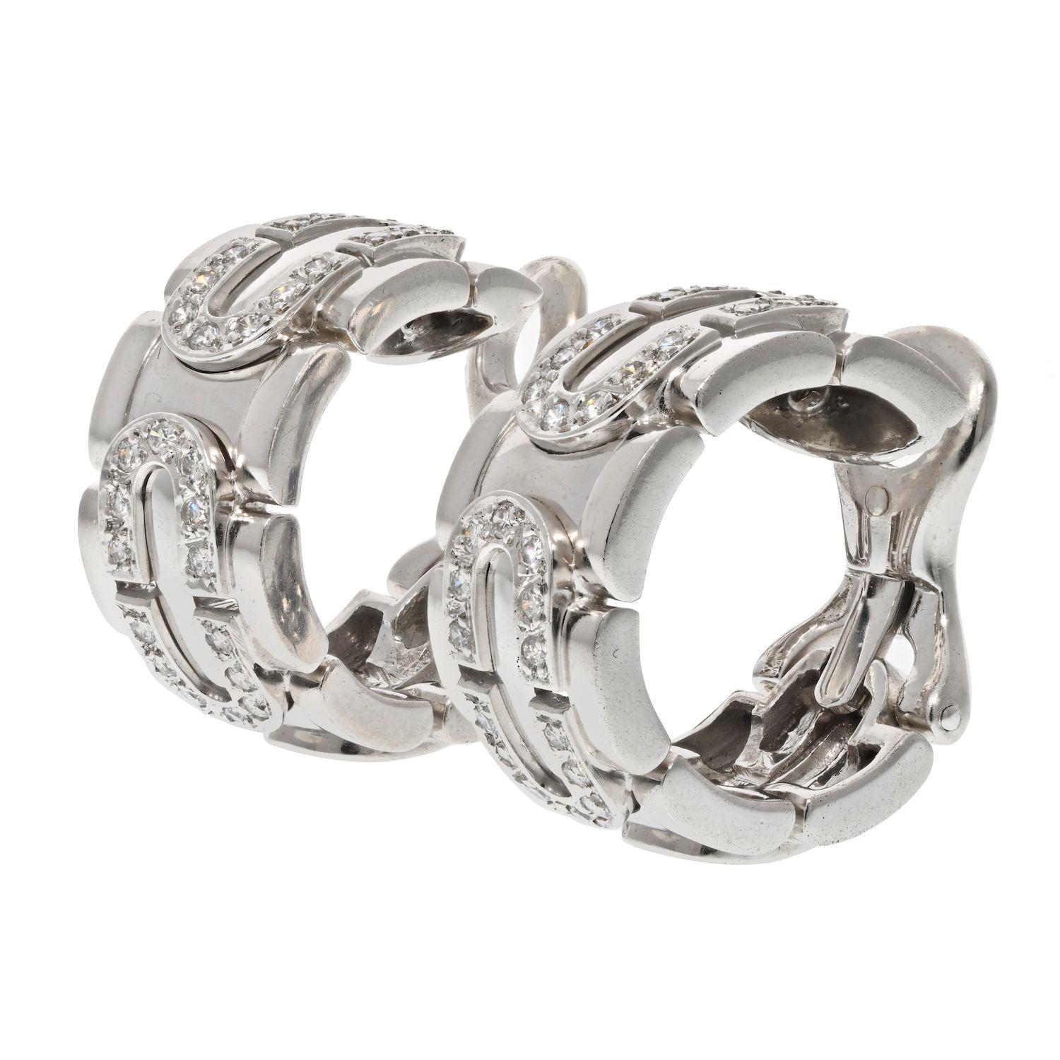 Cartier 18K White Gold Diamond Hoop Earrings.
Classic Cartier earrings from our estate collection. Popular clip-on style that is perfect to wear from day to night. 
Earrings measure: 1 inch long, and 0.4 inches wide.