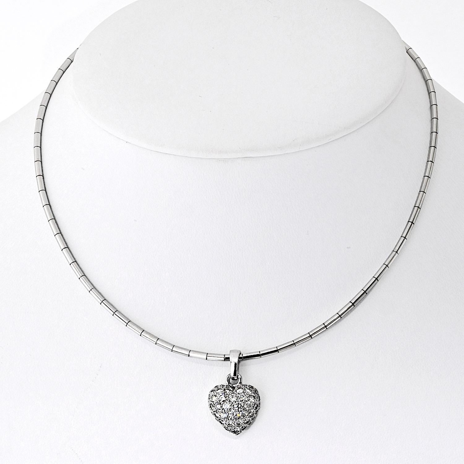 Estate Cartier 18K White Gold Pave Diamond Heart Necklace. This elegant piece features the original heart pendant and chain, both signed Cartier with proper hallmarks and serial numbers. Crafted in 18K white gold and weighing 17 grams, it is adorned