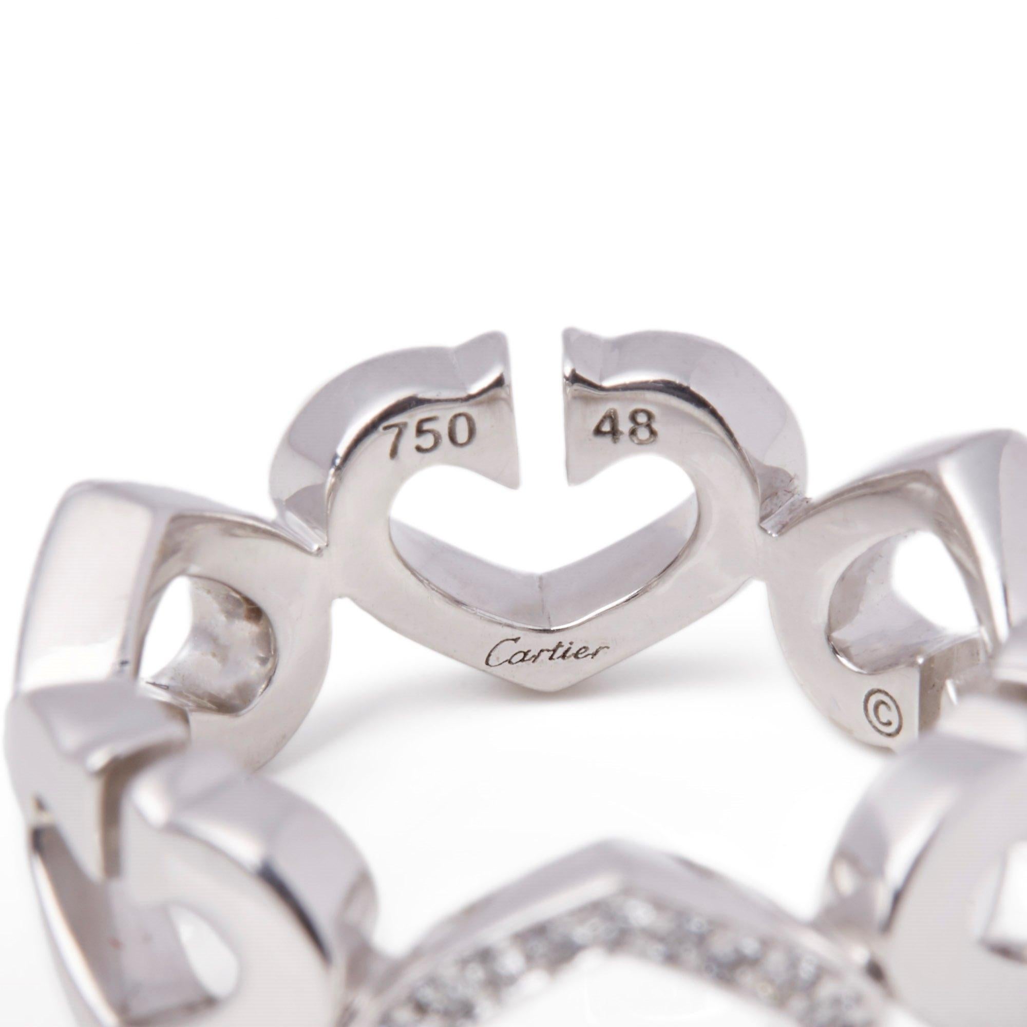 Contemporary Cartier 18 Karat White Gold Hearts and Symbols Ring
