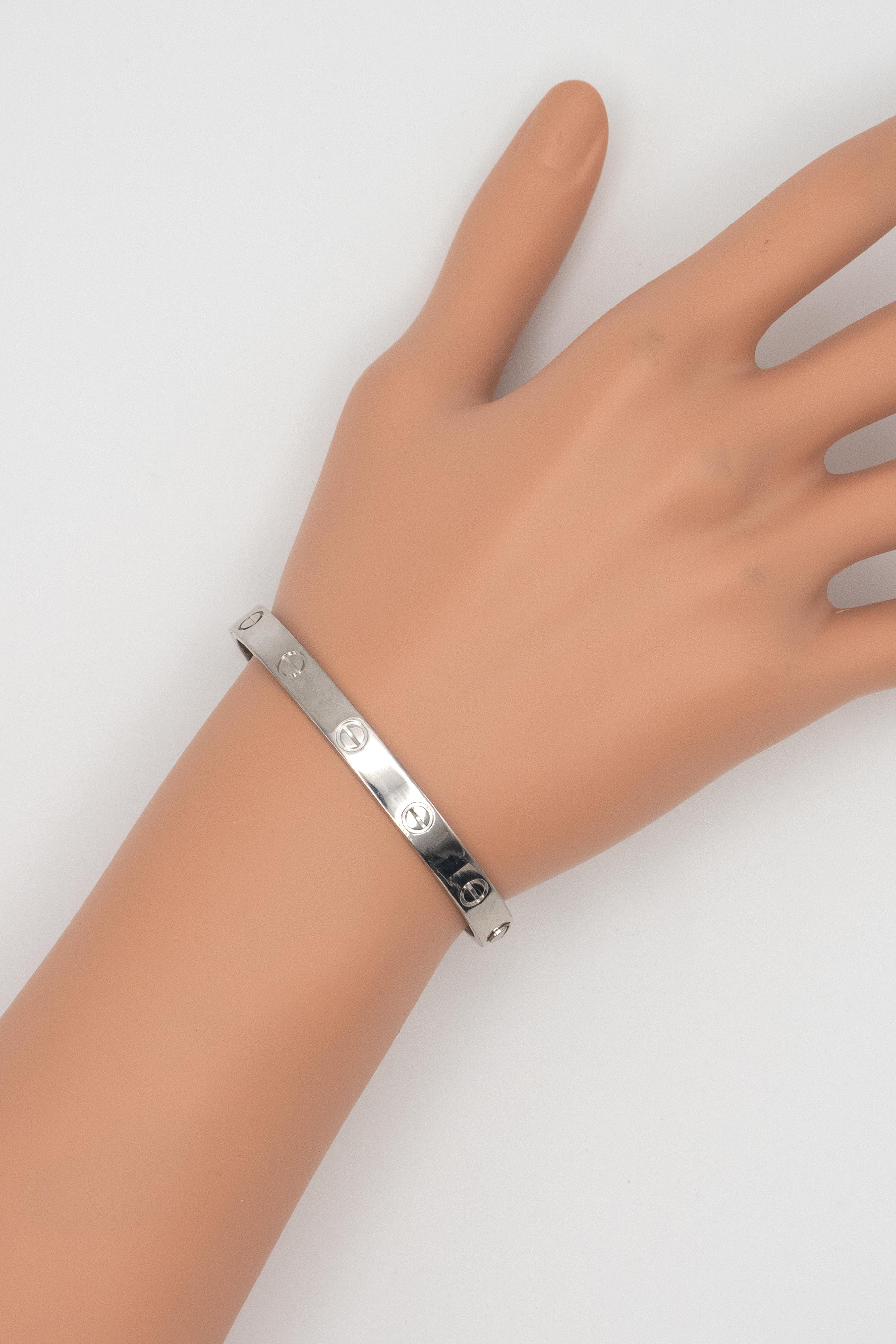 An iconic symbol of everlasting love, this authentic Cartier Love Bangle is crafted in 18K white gold. Designed in 1969 by Aldo Cipullo for Cartier, the Love collection has become one of the house’s most recognized and sought-after creations.

Size: