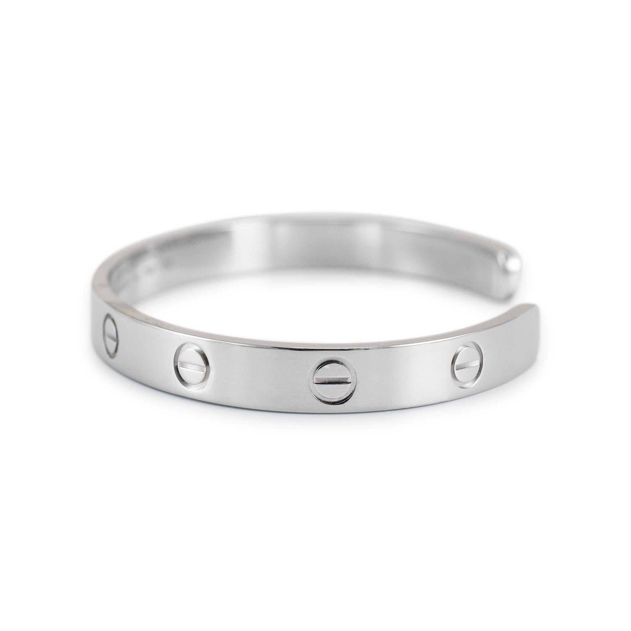 Brand: Cartier 

Metal Type: 18K White Gold

Length: 6.00 inches

Width: 6.15 mm 

Weight: 25.42 grams

Rhodium-plated 18K white gold diamond cuff bracelet. Engraved with 