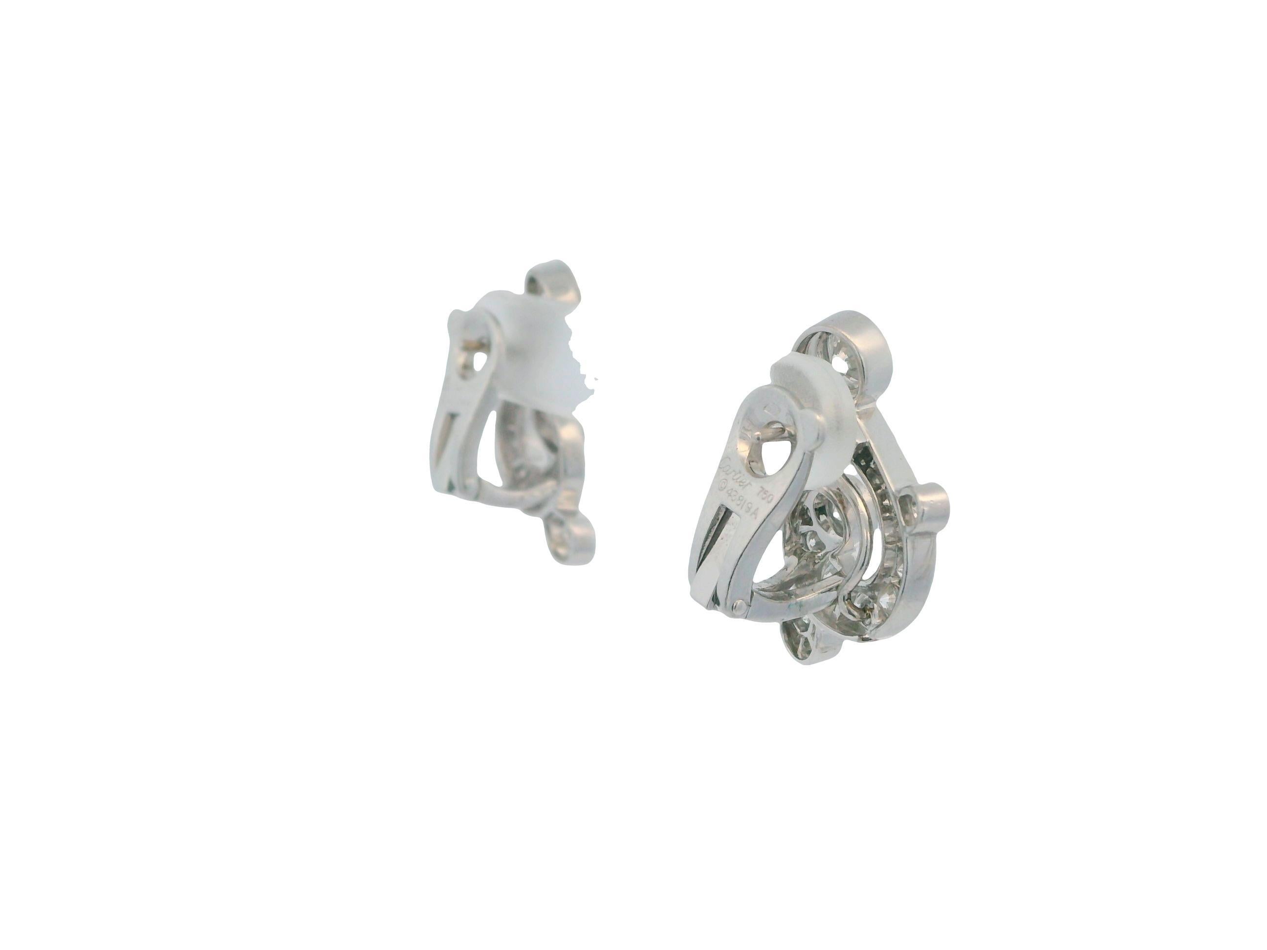 Boucles d'oreilles jour et nuit en or blanc 18 carats et pavés de Cartier Unisexe en vente