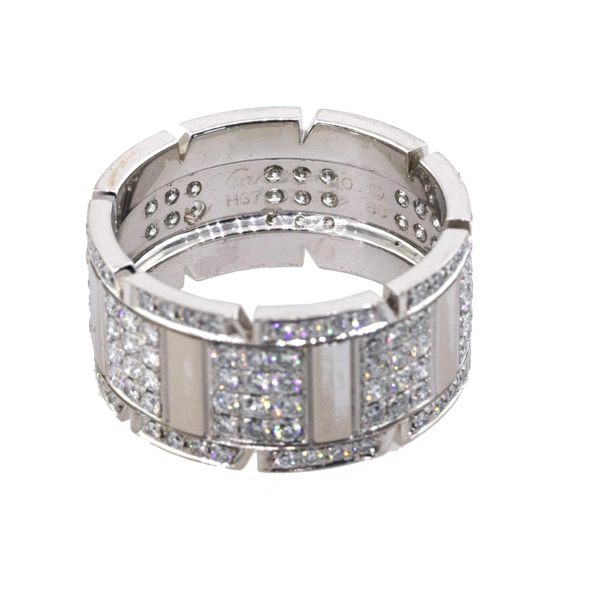 Designer: Cartier
Material: 18k white gold and aftermarket Diamonds
Diamond Details: Approximately 4.5ctw of round brilliant diamonds, Diamonds are G/H in color and SI in clarity
Ring Size: Size 12
Ring Measurements: 0.98