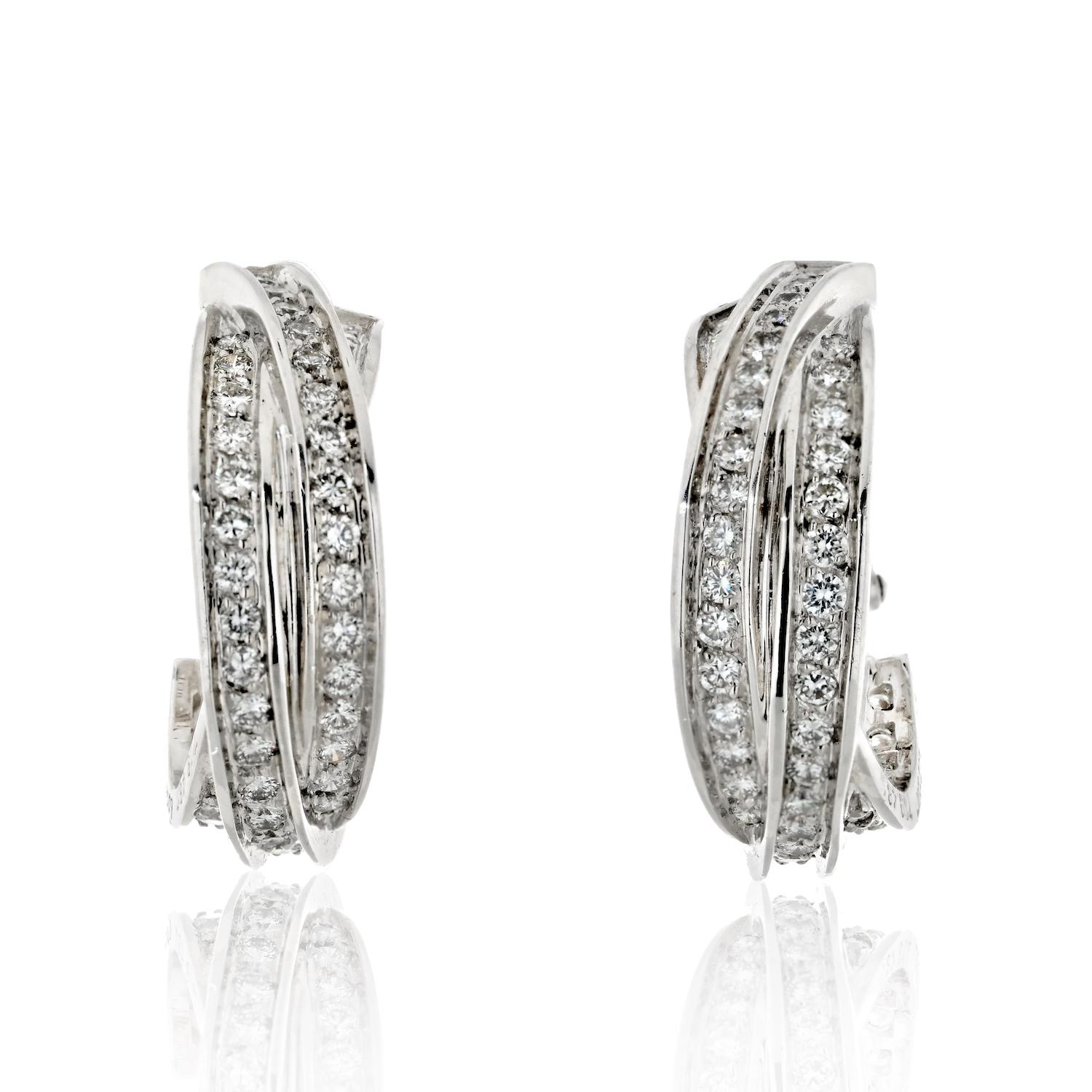 The Cartier 18K White Gold Trinity Diamond Short Hoop Earrings are a stunning piece of jewelry designed for pierced ears. The earrings feature a classic hoop shape with a sleek white gold finish, and are adorned with shimmering diamonds that add a