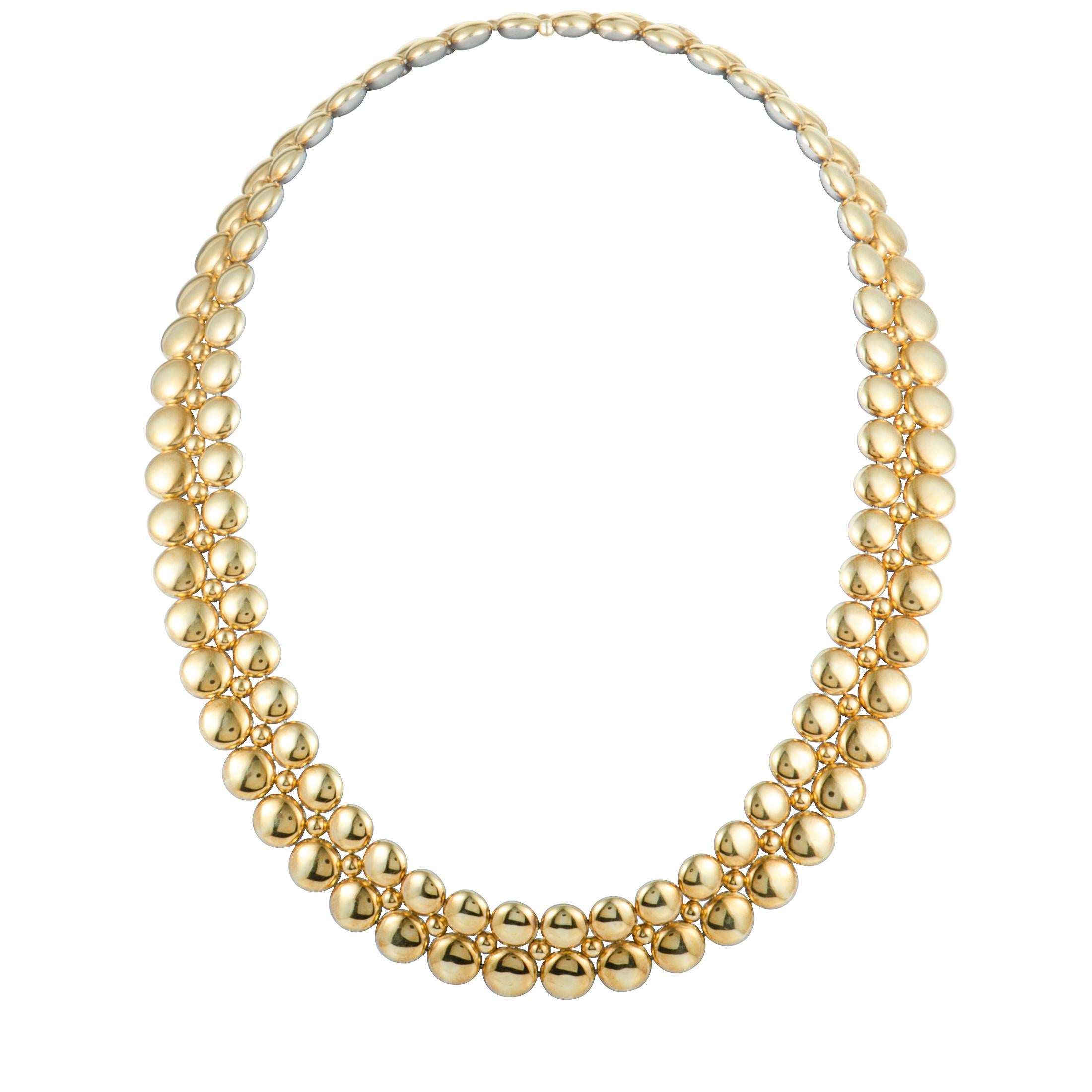 Fashionably embellish your outfit with this elegant necklace by Cartier. Beautifully designed with the glamorous combination of 18K white and yellow gold, the stunning necklace is embellished with 5.25ct of E-color, VS1 clarity sparkling