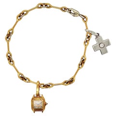 Cartier Bracciale Charm in oro giallo e bianco 18 ct.