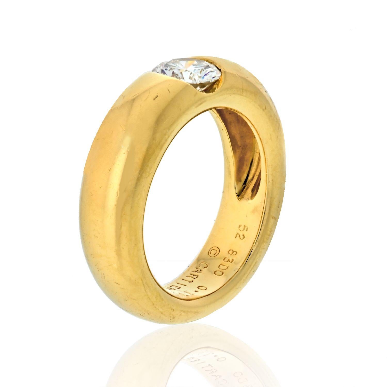 Cartier yellow gold diamond engagement ring crafted in 18K gold set with round brilliant cut diamond.

Crafted in 18K gold; set with a round brilliant-cut diamond, weighing 0.77 carat (diamond weight is engraved), with E-F color and VVS clarity;