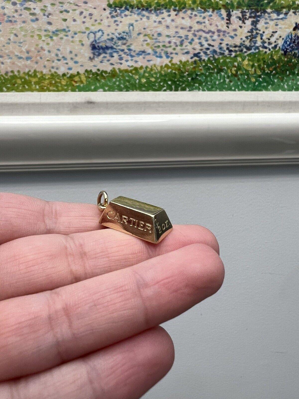 cartier gold bar charm