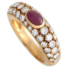 Cartier Ring aus 18 Karat Gelbgold mit 1,00 Karat Diamant und Rubin