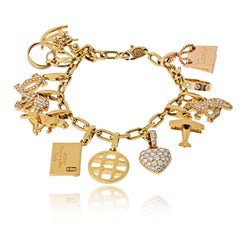 Bracelet 12 breloques en or jaune 18K de Cartier