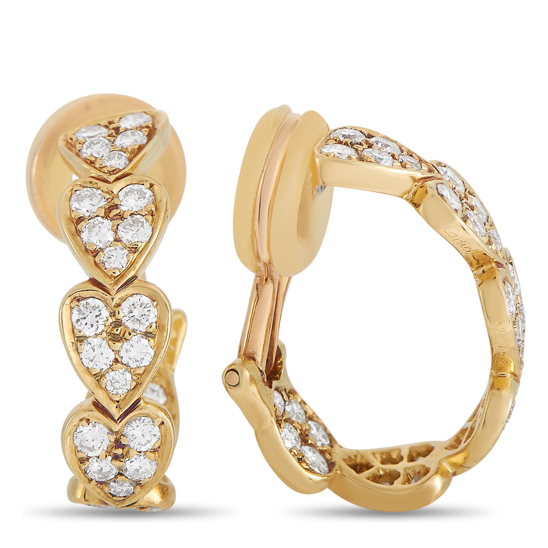 These Cartier earrings are inherently romantic. A series of hearts in 18K Yellow Gold make up the elegant hoop-shaped design, but it’s the glittering array of diamonds totaling 1.35 carats that truly brings them to life. Each one measures .25” long,