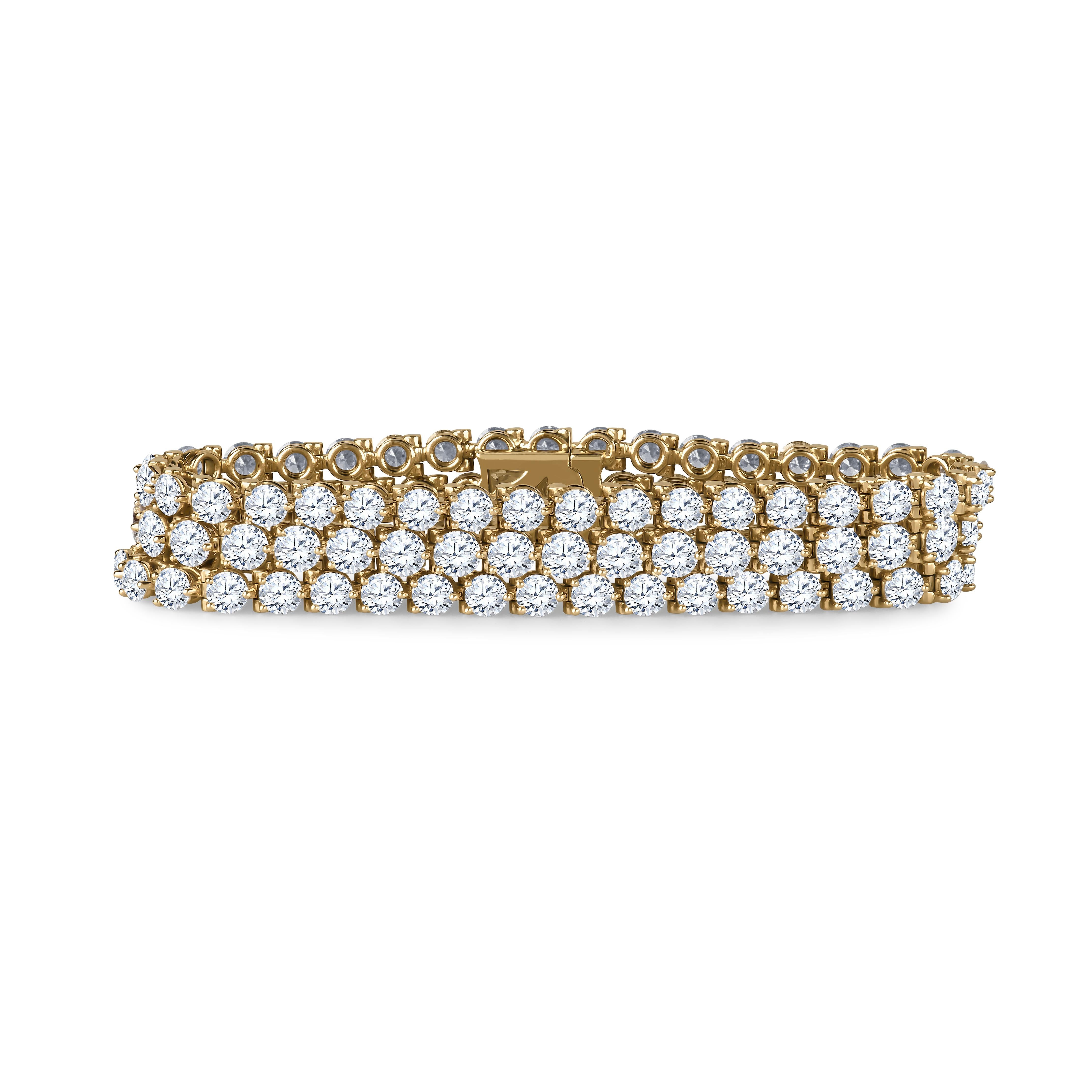 Cartier 18k yellow gold 3-row bracelet with approximately 26.71 carat total weight in Diamonds. Beautifully matched diamonds of D-F color, VVS1-VS2 clarity.  Comes with Cartier inner and outer box.