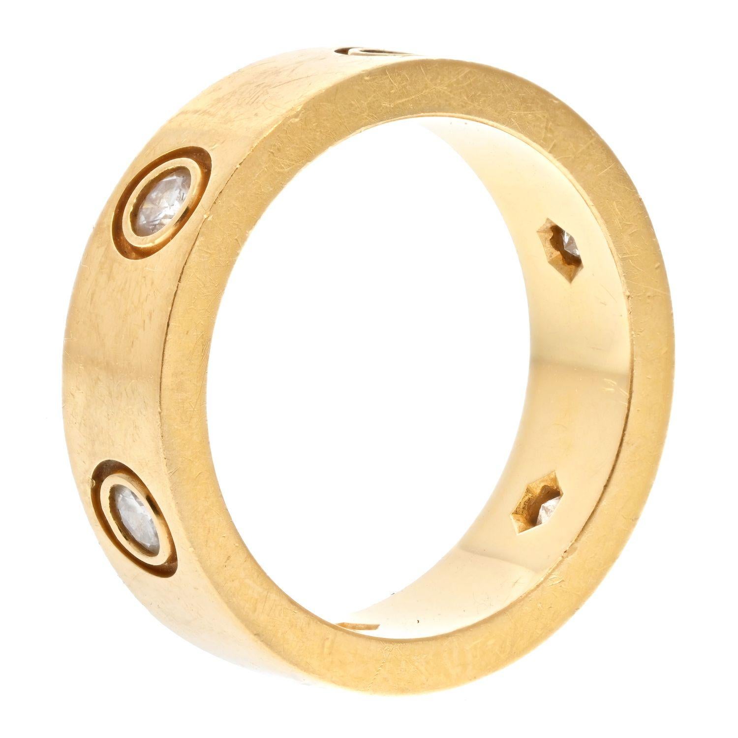Cartier Love 18K Yellow Gold 6 Diamond Love Ring.
Pre-owned with some signs of wear this ring is in good condition. 
Features 6 diamonds, and is from the Love collection, Cartier. 
18K Yellow Gold. This ring can be polished upon request. 
Size 51. 