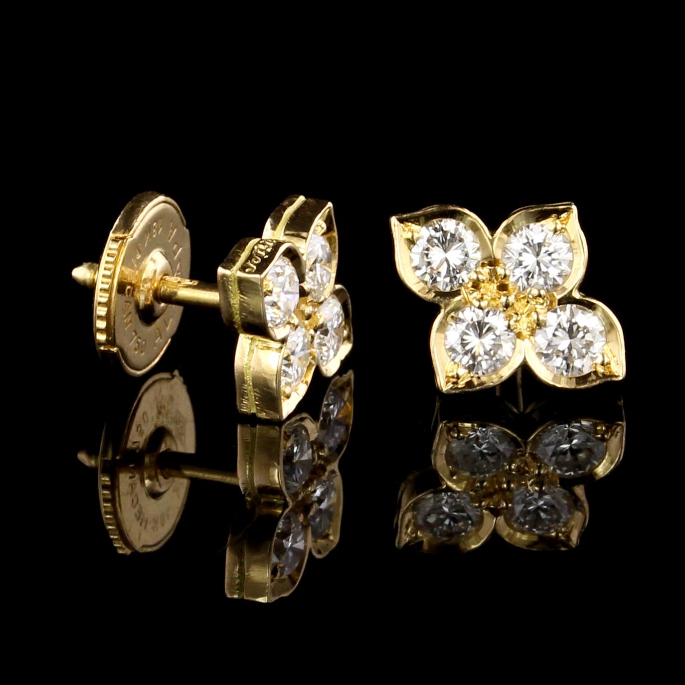 Cartier 18K Yellow Gold and Diamond Hindu Flower Earrings. The earrings are set
with eight full cut diamonds, approx. total wt. .80cts., F color, VS clarity, #C96089,
with original box.