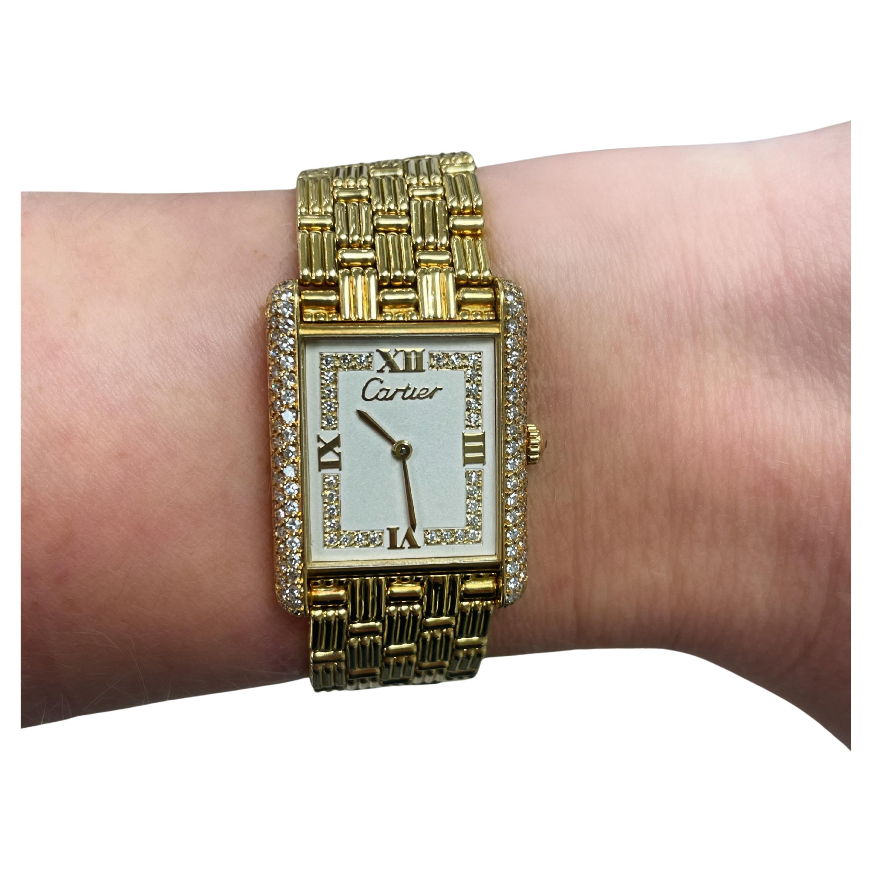 Cartier, montre Tank Louis en or jaune 18 carats et diamants