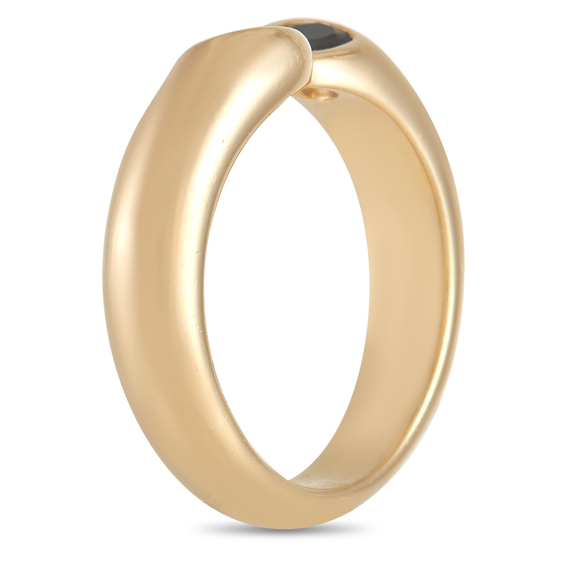 Despite its simple, streamlined aesthetic, there’s something decidedly contemporary about this Cartier ring’s negative space design. A bold 4mm wide band crafted from 18K Yellow Gold provides the perfect foundation for this luxury piece, which is