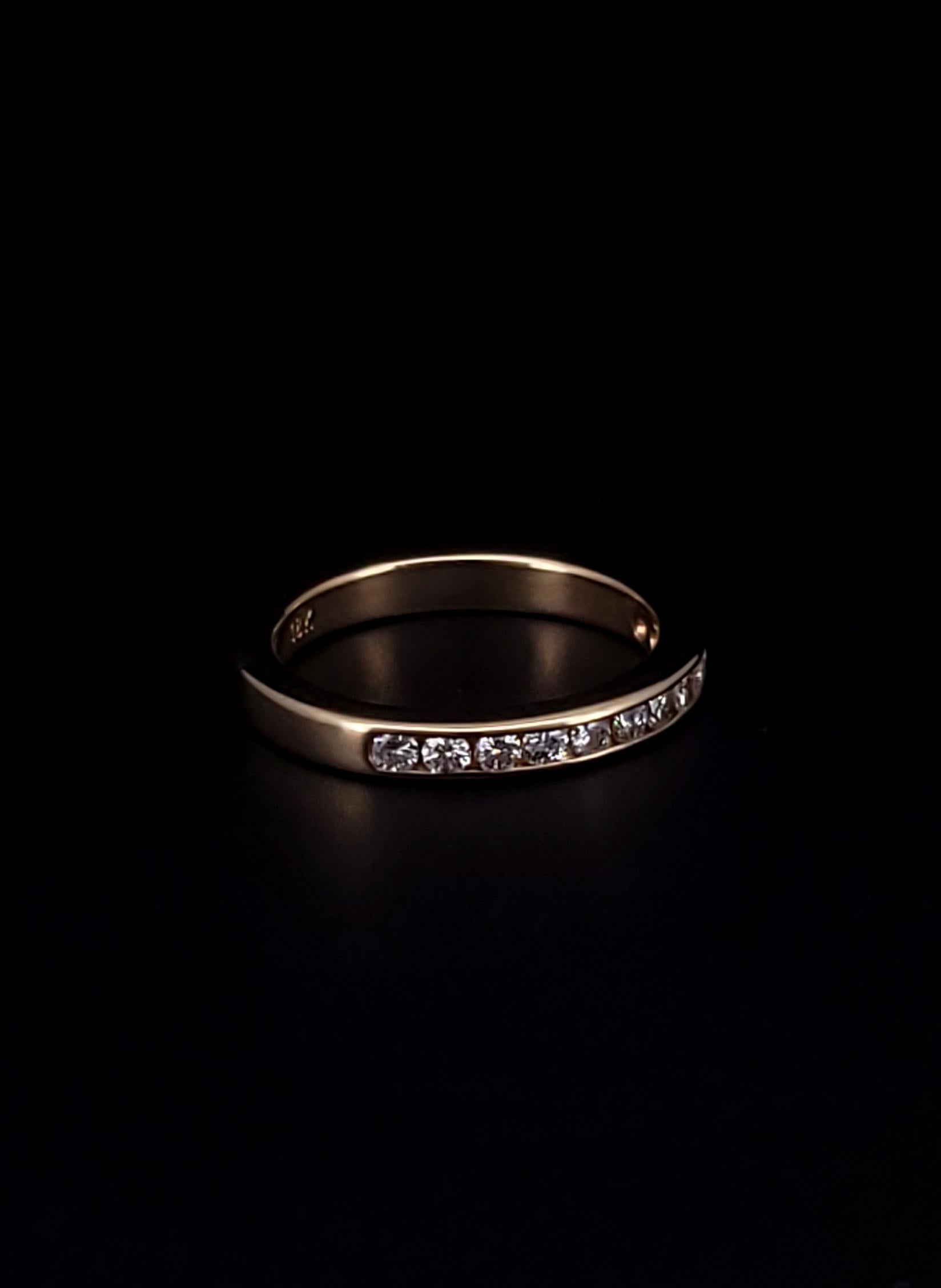Cartier 18K Yellow Gold Channel Set Round Diamonds Band Ring In Excellent Condition For Sale In New York, NY