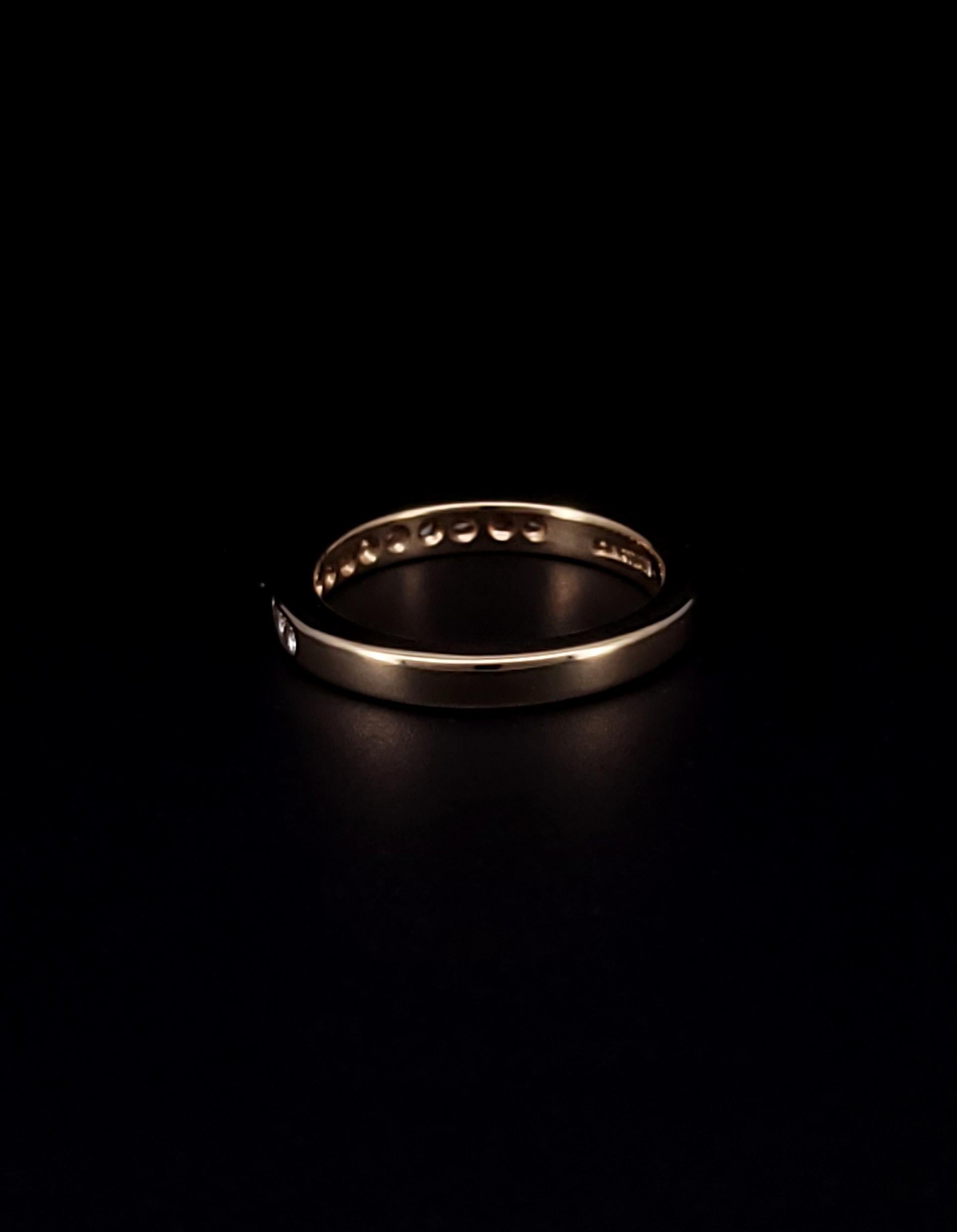 Women's Cartier 18K Yellow Gold Channel Set Round Diamonds Band Ring For Sale