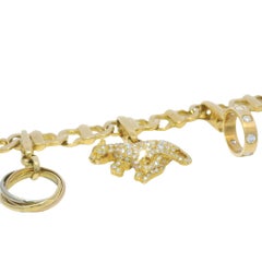 Cartier 18k Yellow Gold Charm Bracelet With 7 Charms In Stock