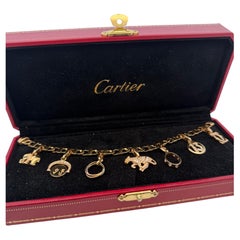 Cartier 18k Yellow Gold Charm Bracelet With 7 Charms In Stock