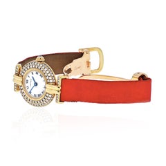 Cartier Montre à bracelet en or jaune 18 carats avec diamants en forme de colisee et satin