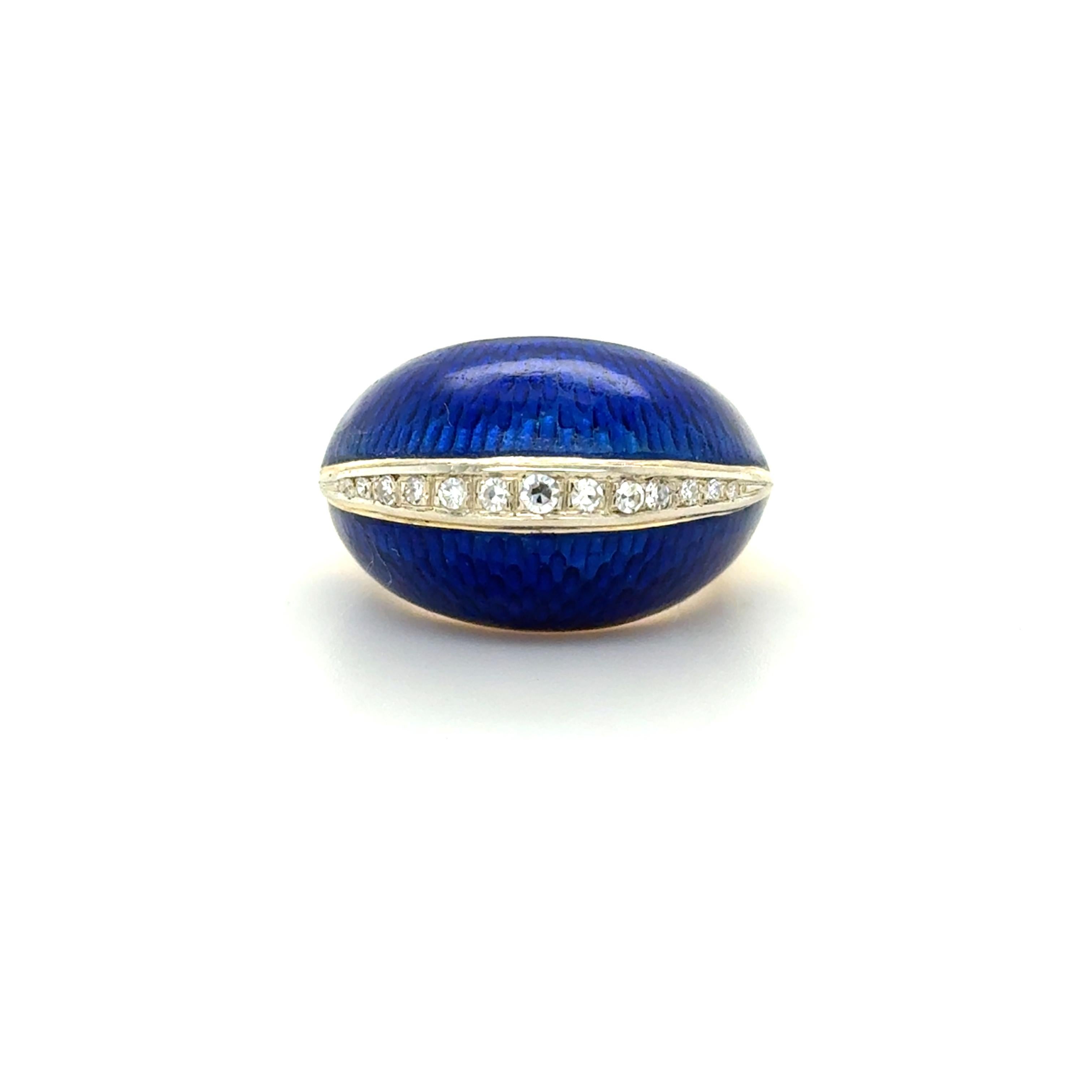 This fun Cartier cocktail bombe ring is dome shaped with central line of diamonds weighing approximately 0.20 carat total, flanked by bright royal blue enameling, adding a pop of color!

Stamp: 37432 Cartier 18KT ITALY 36310
Ring Size: 5