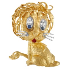 Cartier 18K Yellow Gold Diamond and Sapphire Cat Brooch